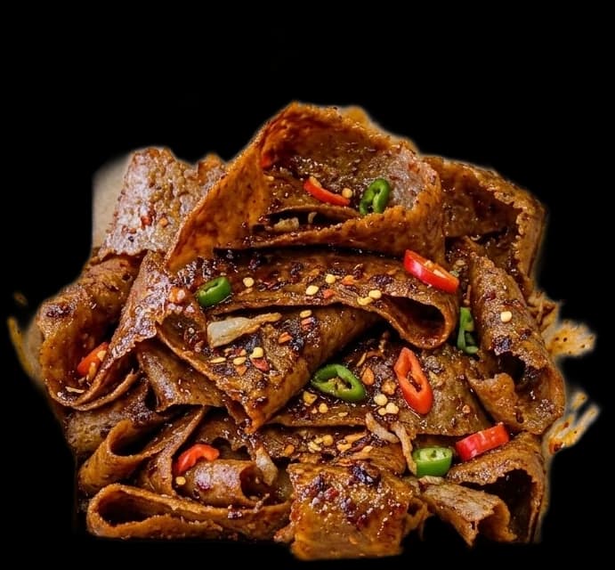 Naga beef donner with grilled peppers, chillies and naga sauce